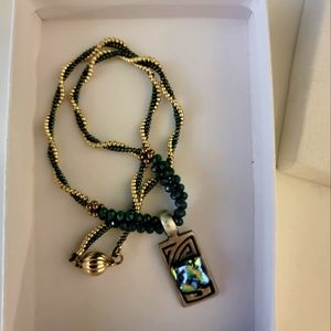 18" Beaded Gold and Green necklace with 1" silver Pendant with rainbow stone